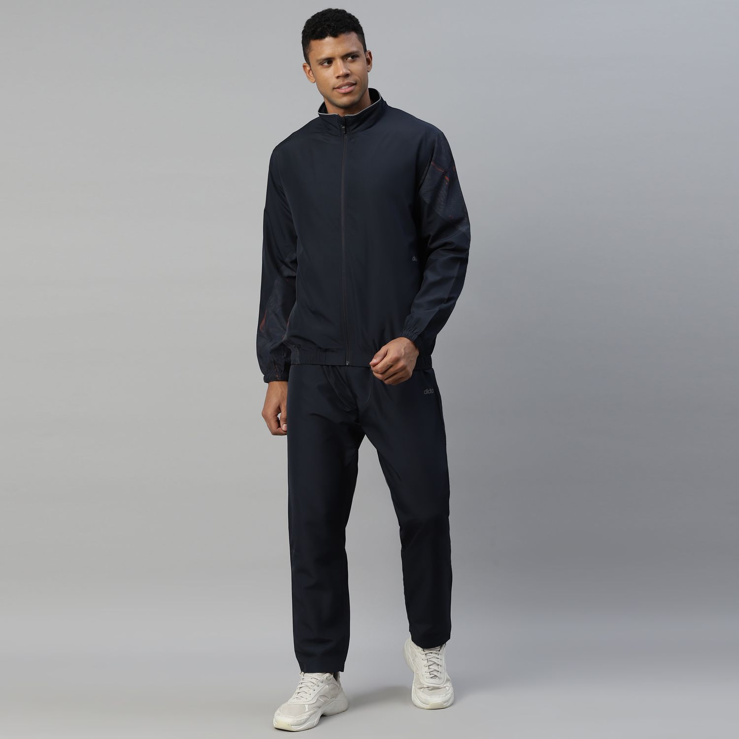     			Dida Sportswear Navy Polyester Regular Fit Solid Men's Sports Tracksuit ( Pack of 1 )