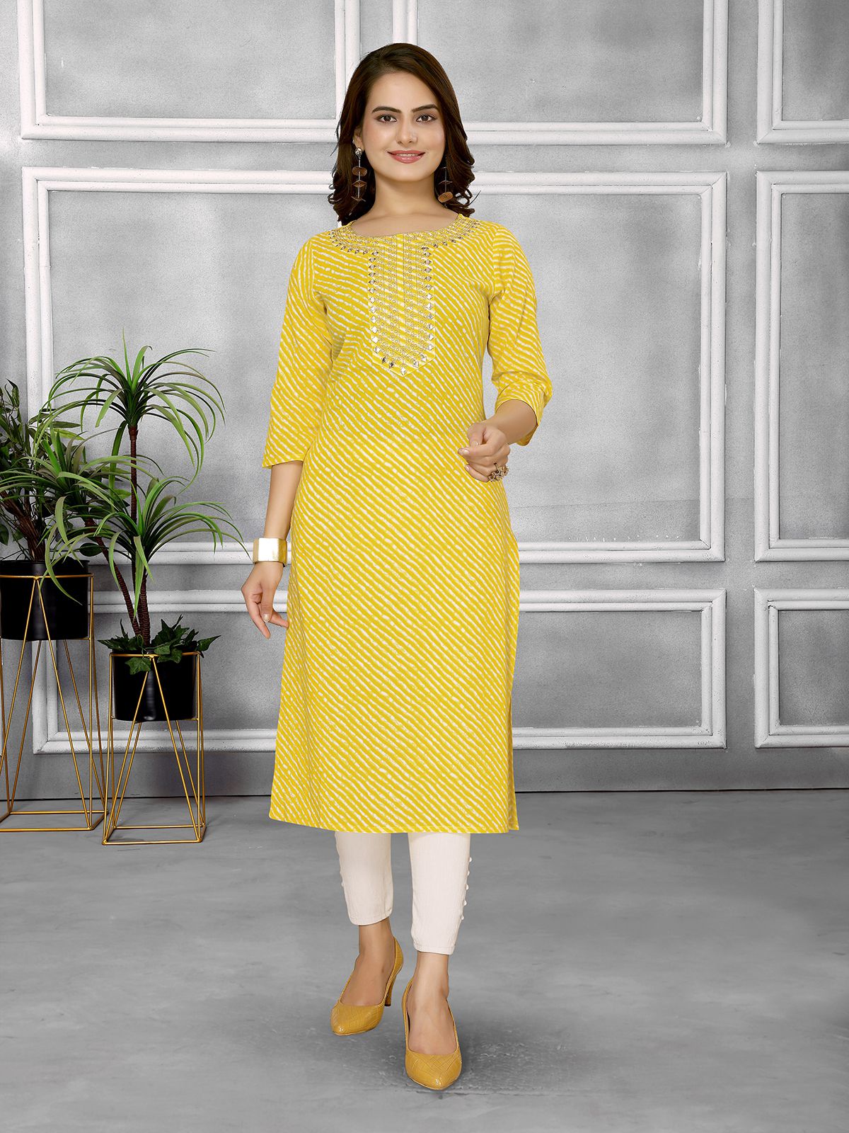     			Rangita Women Cotton Yellow Embroidered Calf Length Straight Kurti With Pants