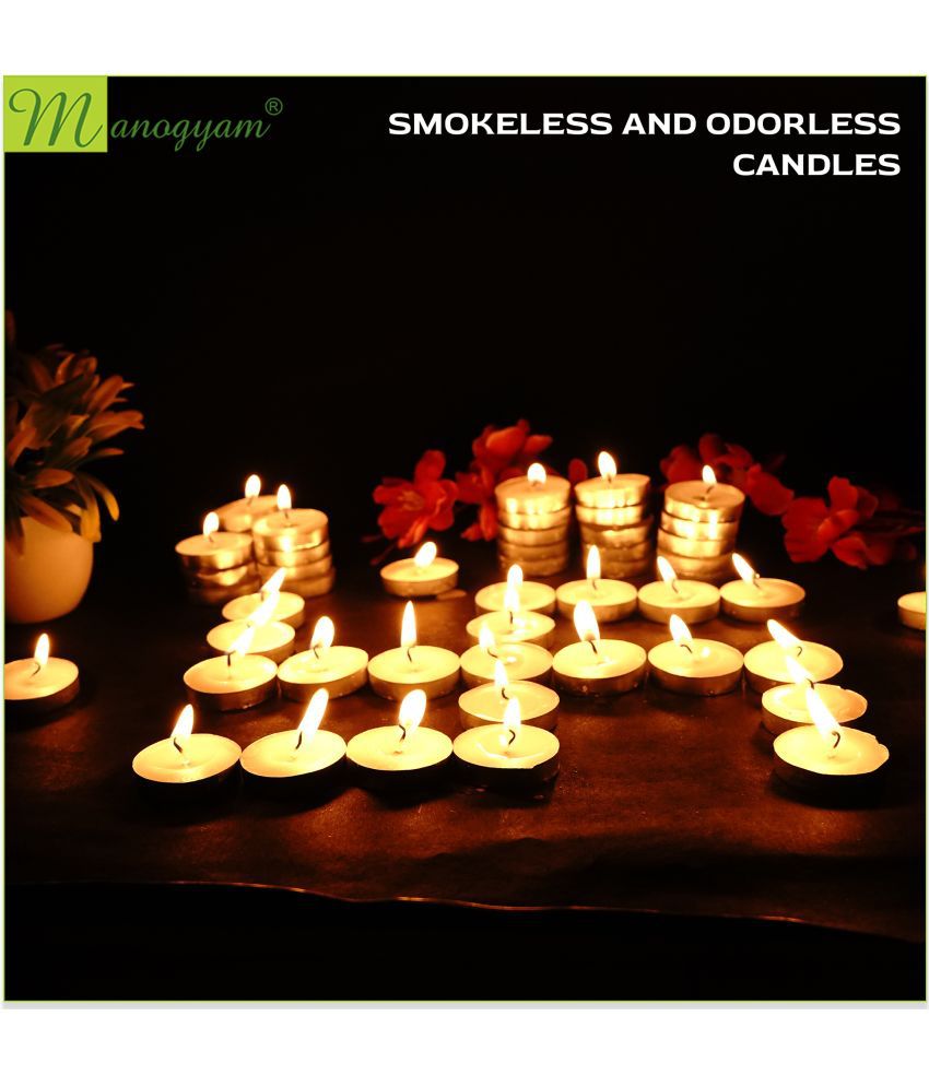     			Manogyam White Wax Tea Light Candle 10 cm ( Pack of 50 )