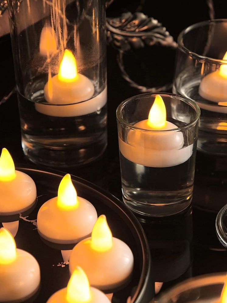     			VM SHOPPING MALL White Floating Candle 5 cm ( Pack of 1 )