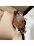 EEWHI Brown Metal Analog Womens Watch