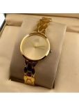 EEWHI Gold Metal Analog Womens Watch